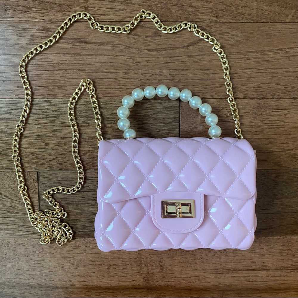 Mini bag with quilted design and pearl handle